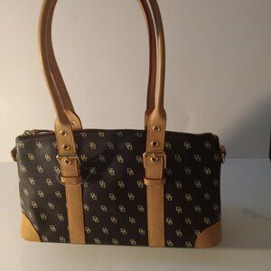 Dooney Bourke Signature Logo Satchel handbag Black and Gold with Tan handles.